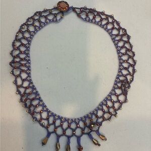 Elegant Purple Beaded Necklace with a feminine Lacey look